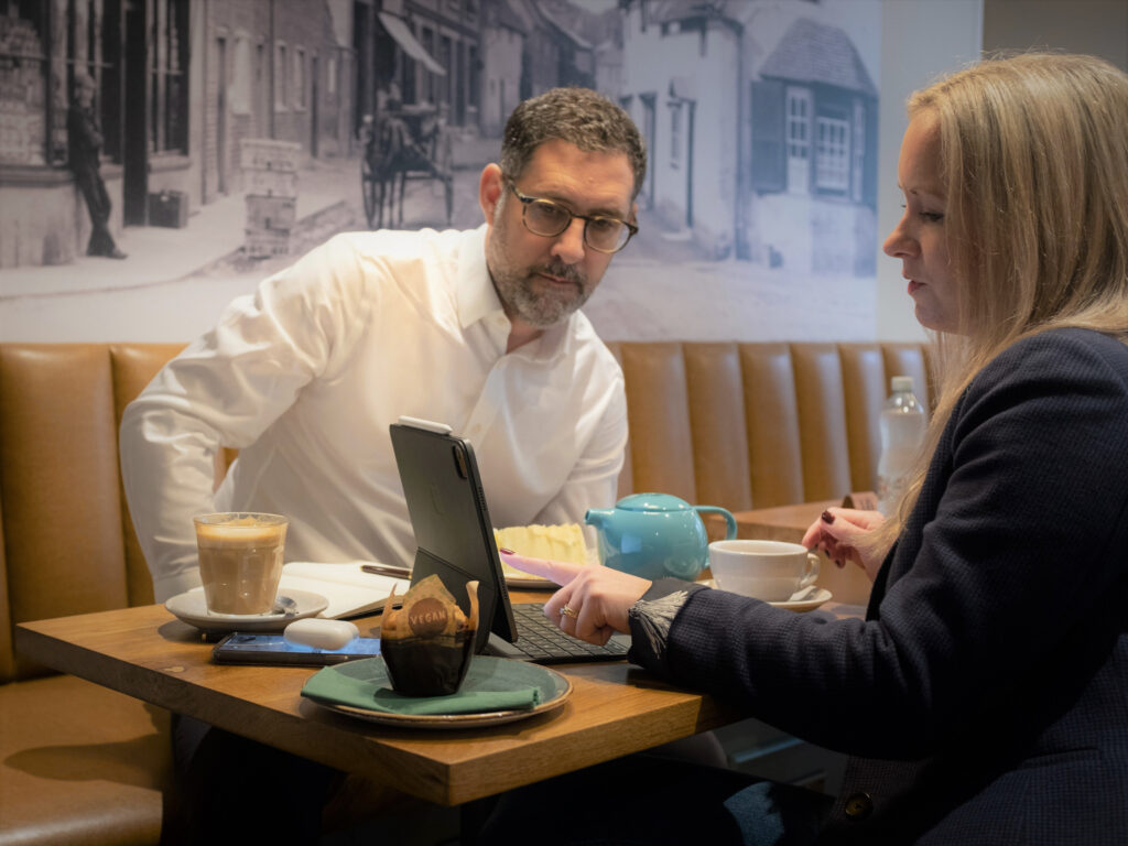 Sarah and Darren Shrubb in a meeting